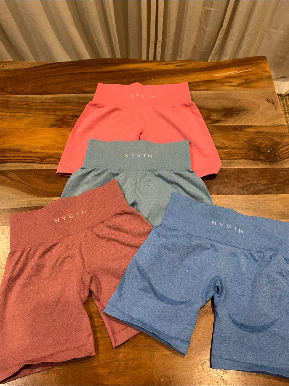 NVGTN Seamless High-Waist Bike Shorts Set — Coral Pink, Rust, Slate, Denim Blue